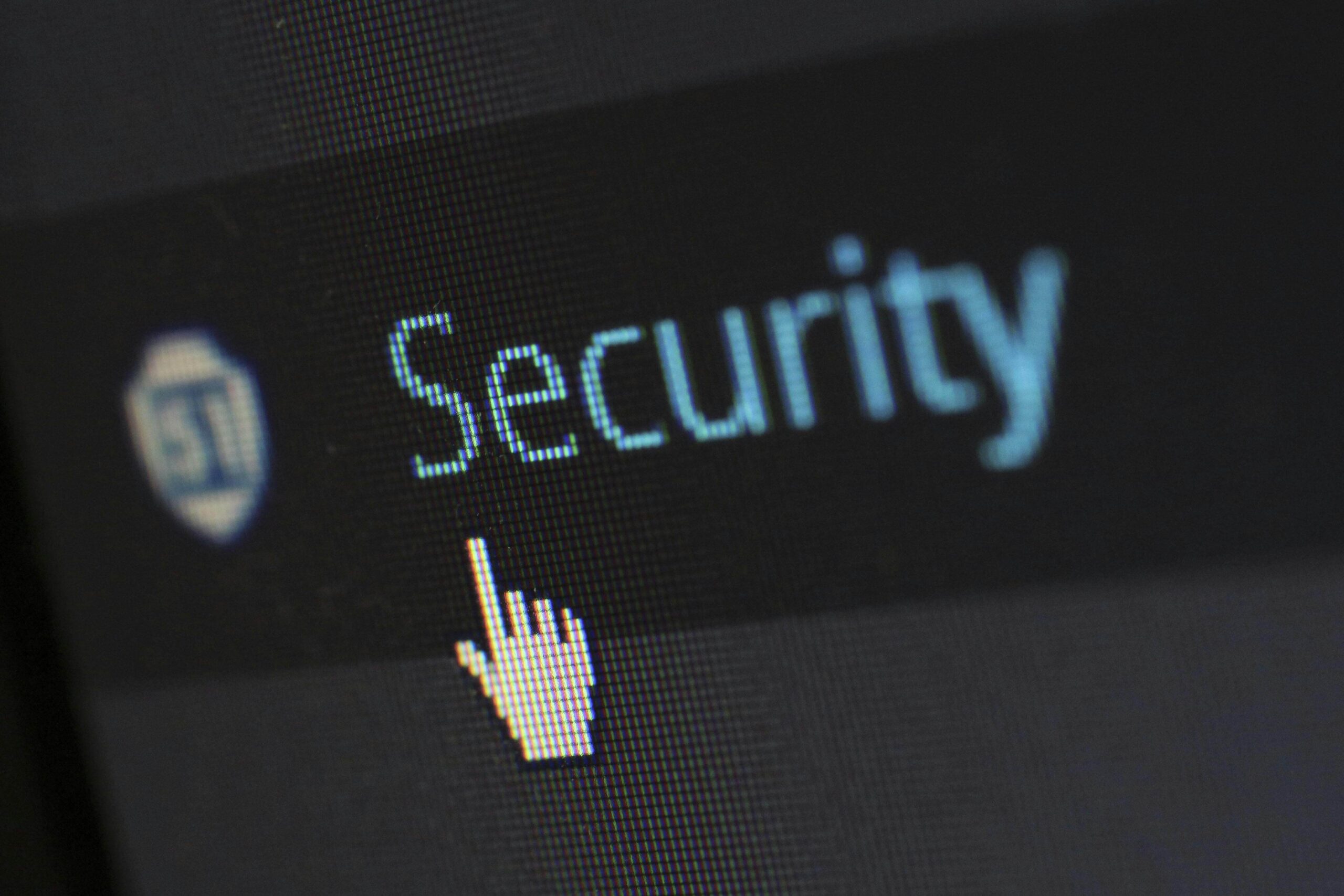a mouse cursor clicking on the word 'security'
